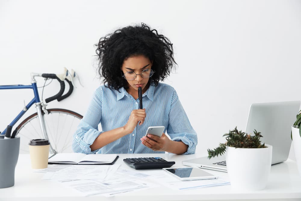 young female entrepreneur in a formal shirt