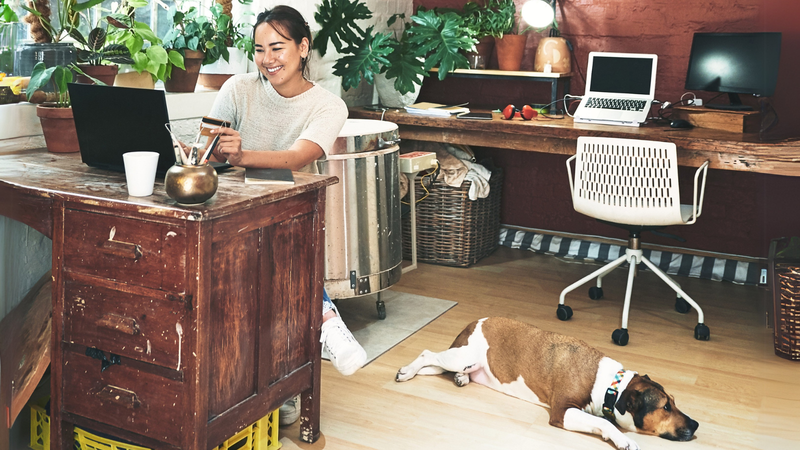 WFH Freelancer with dog at her feet